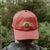 West Coast Seeds - A man wearing an Organic Cotton Hat  in a garden, made in canada
